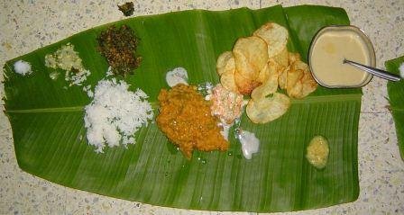 Lunch from Karnataka served on a plantain leaf. south indian cuisine